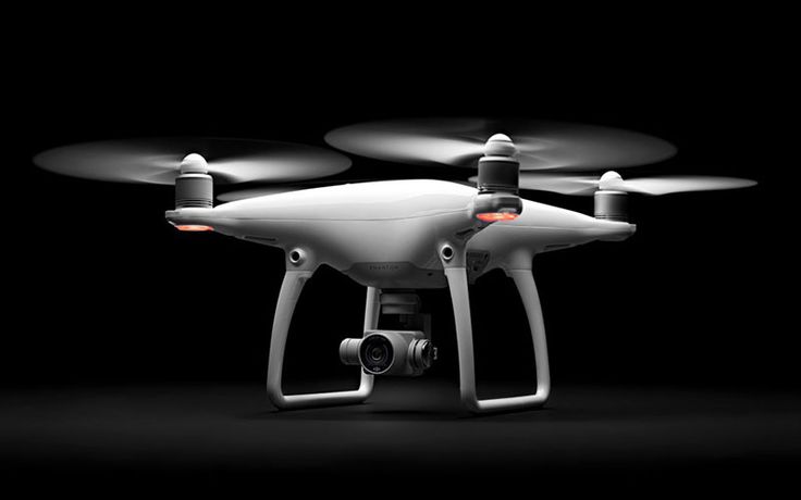 the dji phantom 4 is a camera drone that can fly itself